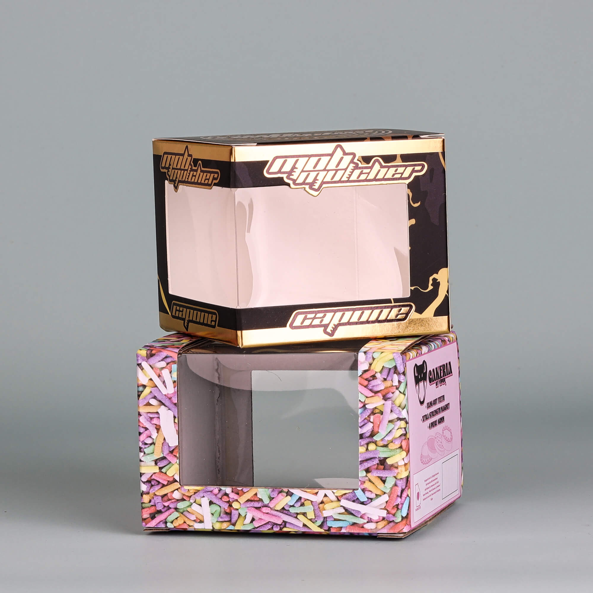 Set of 2 folding cardboard boxes featuring PET transparent windows for product display