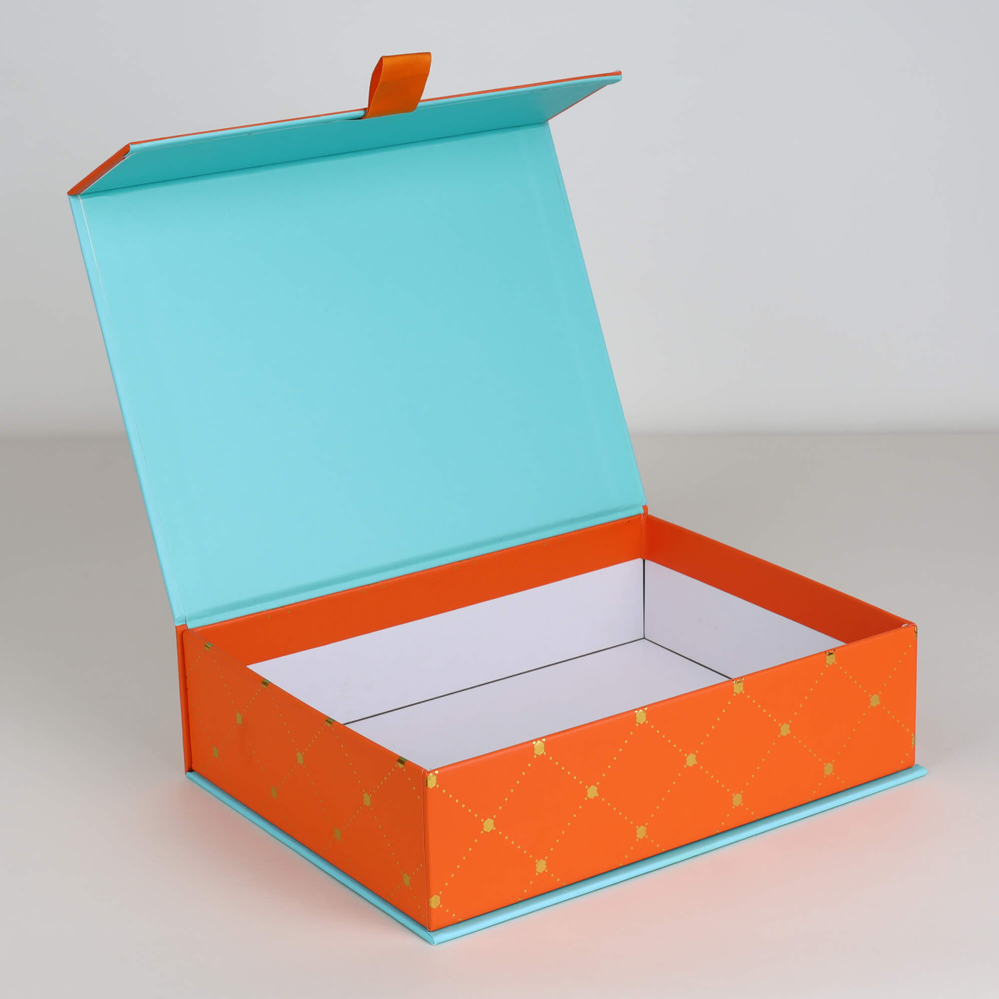 Premium book-style gift box featuring a magnetic closure, designed for luxury packaging